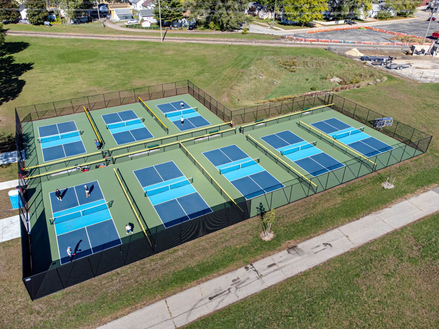 A pickleball court. Not a photograph of a court in Dallas.